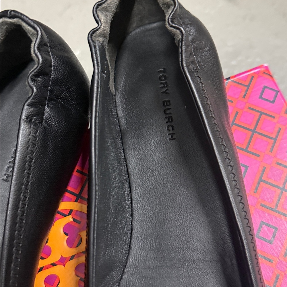 Tory Burch Black Flats with Gold Emblem - Picture 3 of 8